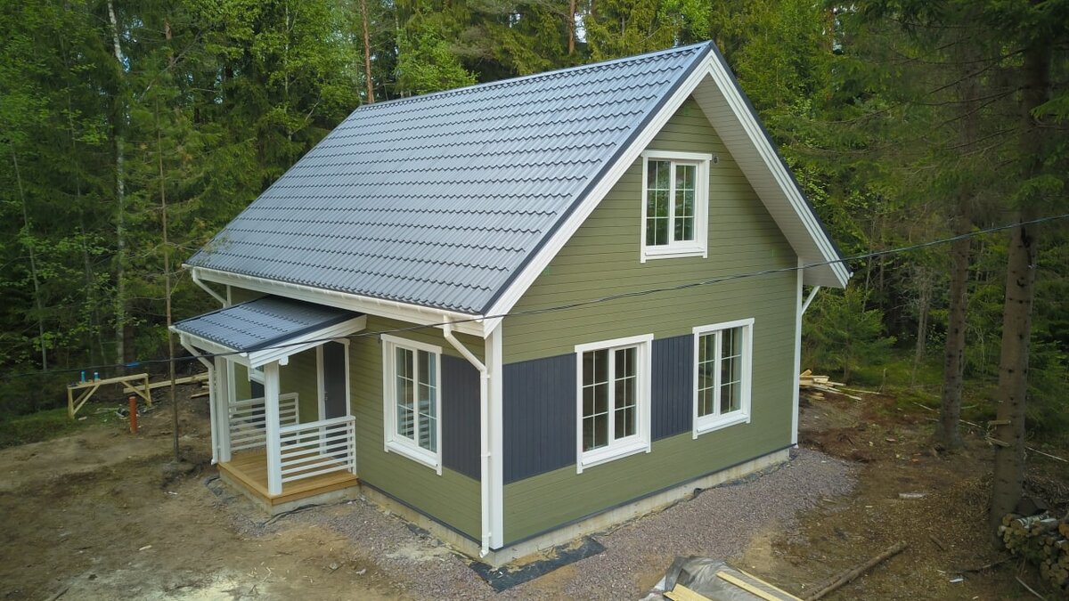 Каркасный дом в лесной чаще Ленинградской области