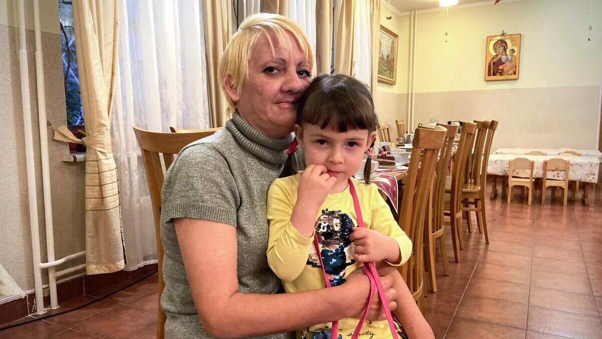    Светлана с дочерью© РИА Новости / Мария Марикян