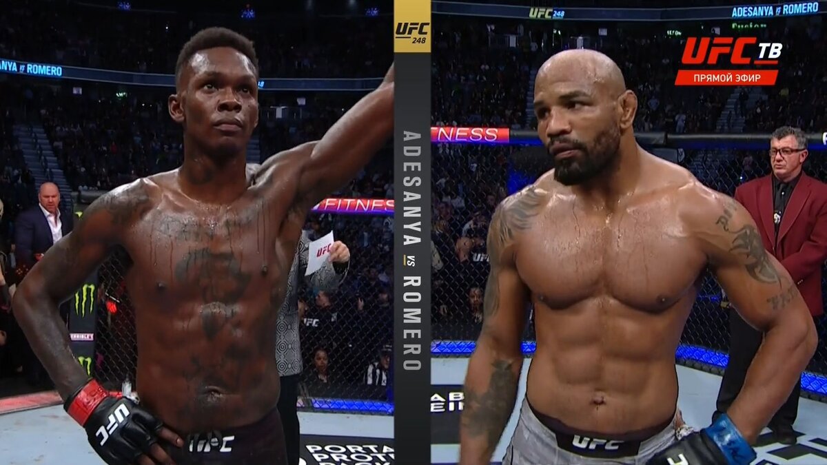 На фото Исраэль Адесанья с его противником - Йоэлем Ромеро. Источник фото: https://www.google.com/url?sa=i&url=https%3A%2F%2Frossaprimavera.ru%2Fnews%2Ff115b807&psig=AOvVaw26Wi33kACpTVLvZ0H5L-KX&ust=1629396924541000&source=images&cd=vfe&ved=0CAsQjRxqFwoTCLjWut-Wu_ICFQAAAAAdAAAAABAf