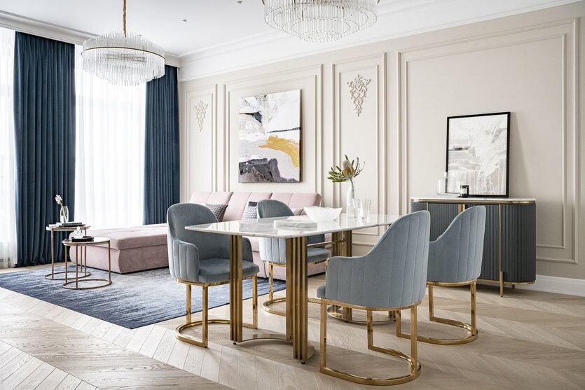 Так как семья хлебосольная и в доме часто собираются родственники, для столовой подобрали обеденный стол с не хрупкой столешницей и основанием в виде опор (куплен у Wooden Kors) — чтобы оно не смотрелось частоколом вместе с ножками стульев. В гостиную рядом поставили большой удобный диван в практичной обивке (Vero). А чтобы этот довольно крупный предмет не давил, выбрали модель в светлых цветах. Люстры марки Bacchetta Di Vetro — из челябинского салона «Модный дом». Оттуда же паркет ёлочкой (Finex).Так как семья хлебосольная и в доме часто собираются родственники, для столовой подобрали обеденный стол с не хрупкой столешницей и основанием в виде опор (куплен у Wooden Kors) — чтобы оно не смотрелось частоколом вместе с ножками стульев. В гостиную рядом поставили большой удобный диван в практичной обивке (Vero). А чтобы этот довольно крупный предмет не давил, выбрали модель в светлых цветах. Люстры марки Bacchetta Di Vetro — из челябинского салона «Модный дом». Оттуда же паркет ёлочкой (Finex).