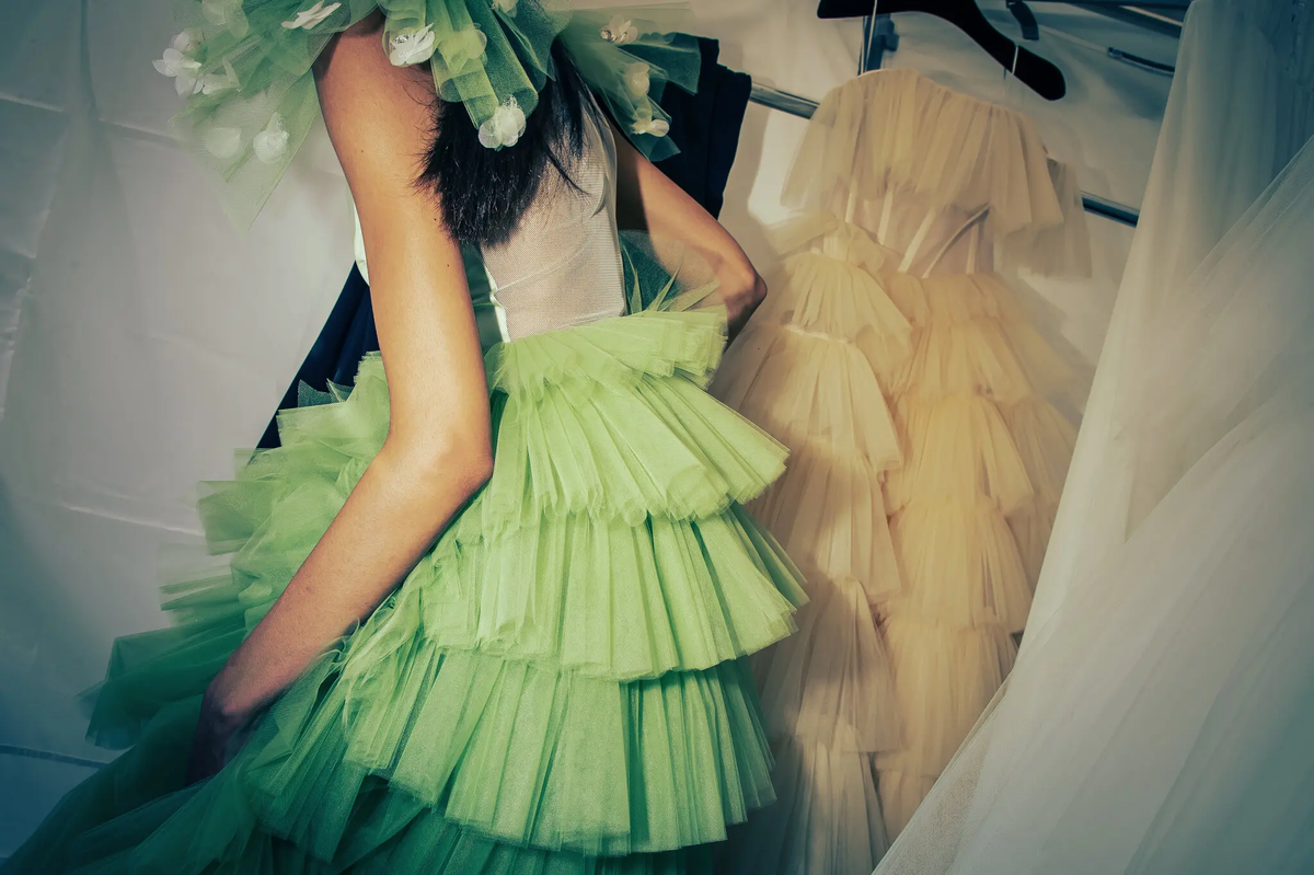 Wedding dresses in green and yellow tulle by Andrew Kwon.