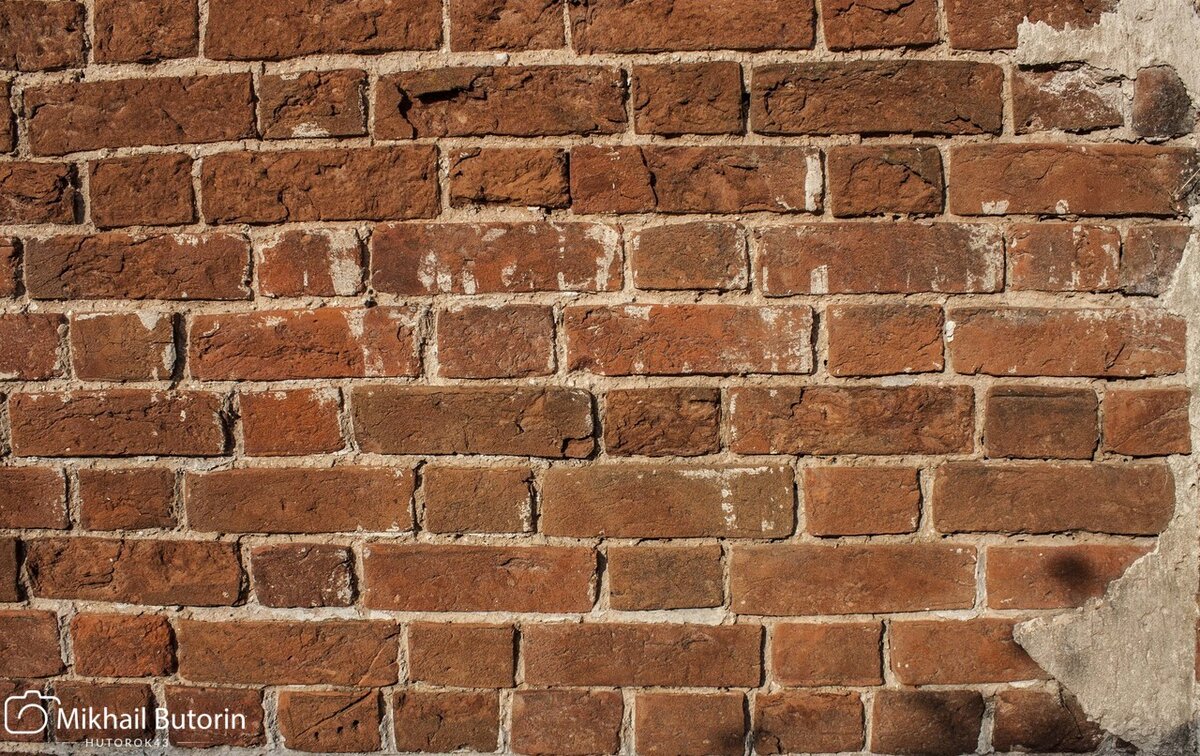 Кирпичная кладка старинного дома.