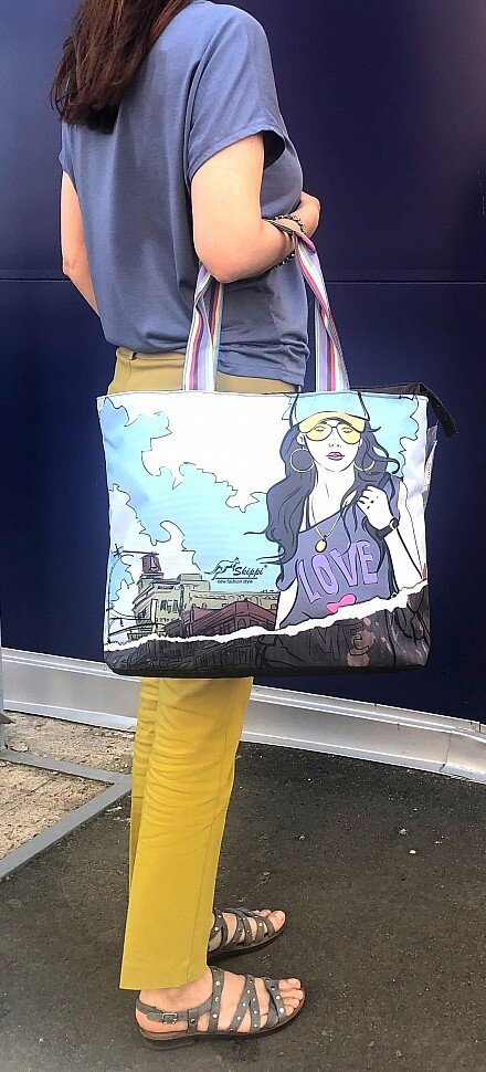 Фотография женской сумки из текстиля