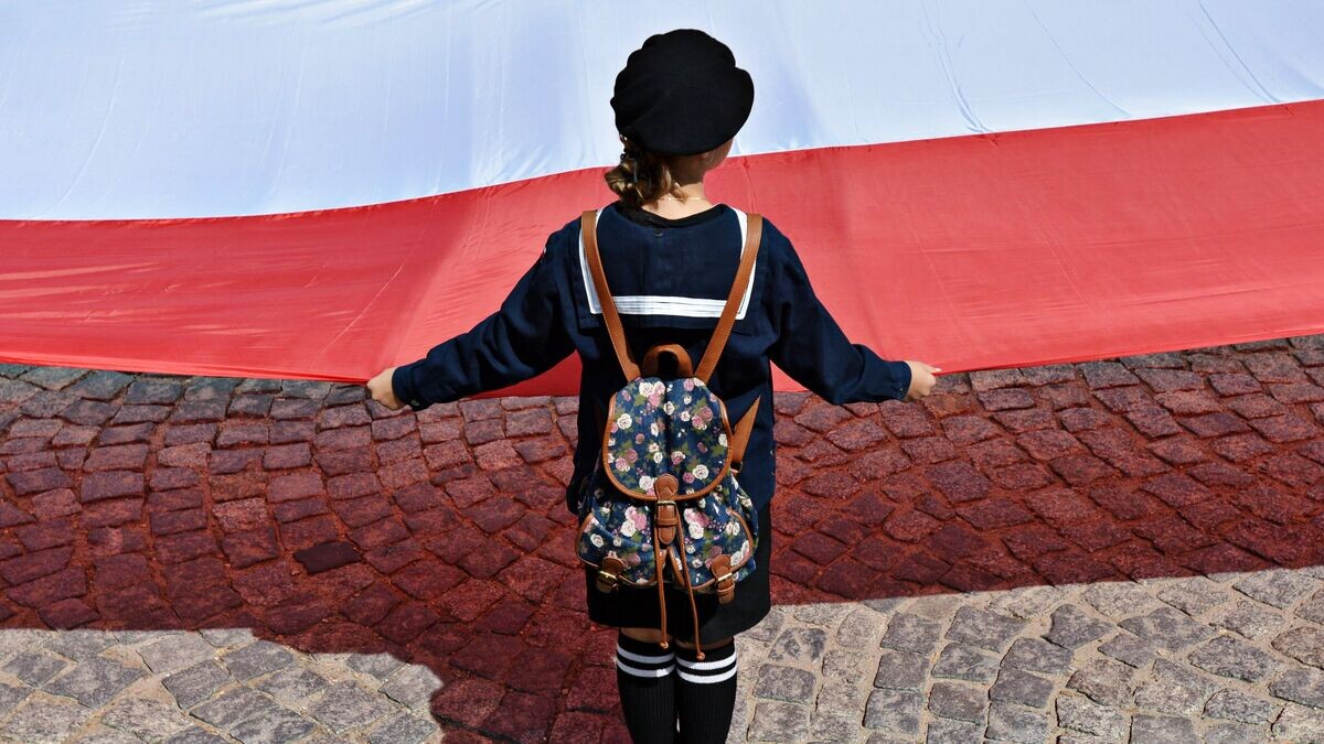    Участница марша памяти жертв Волынской резни в Пшемышле. 10 июля 2016 года © РИА Новости / Алексей Витвицкий