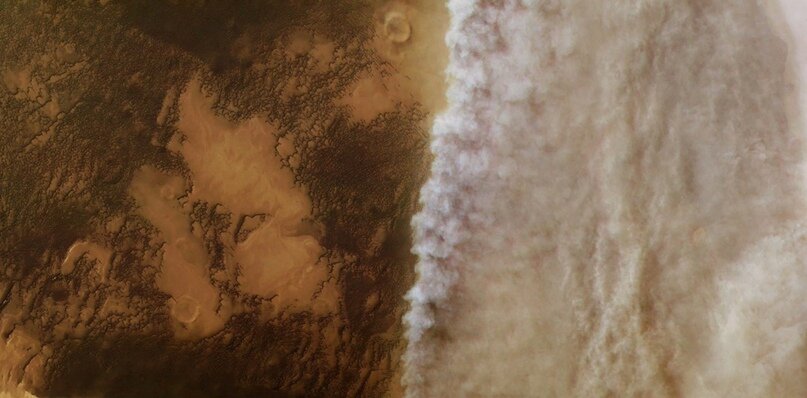 Наступление пылевых облаков на Марсе.