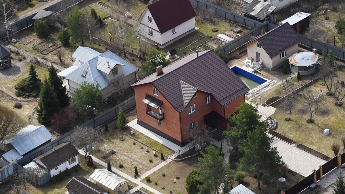    Частные дома в Московской области© РИА Новости / Илья Питалев