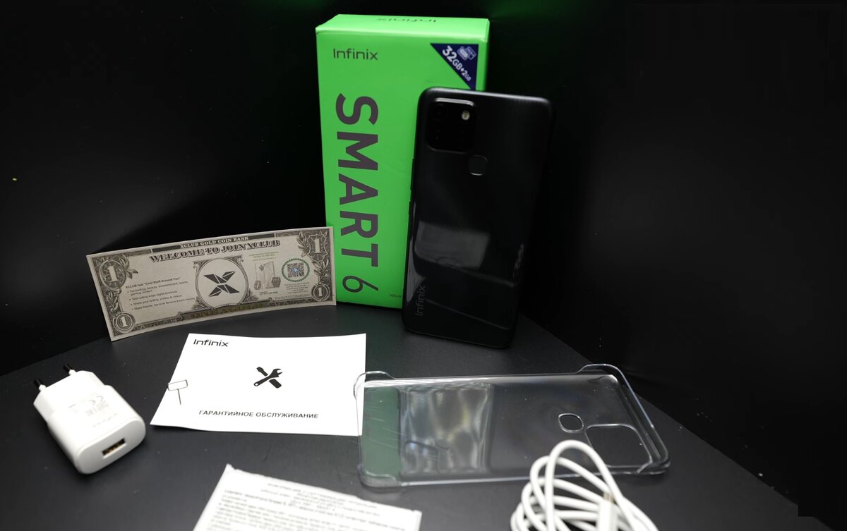 Вы когда-нибудь видели купюры в коробке со смартфоном? Фото: YouTube-канал MegaObzor.com