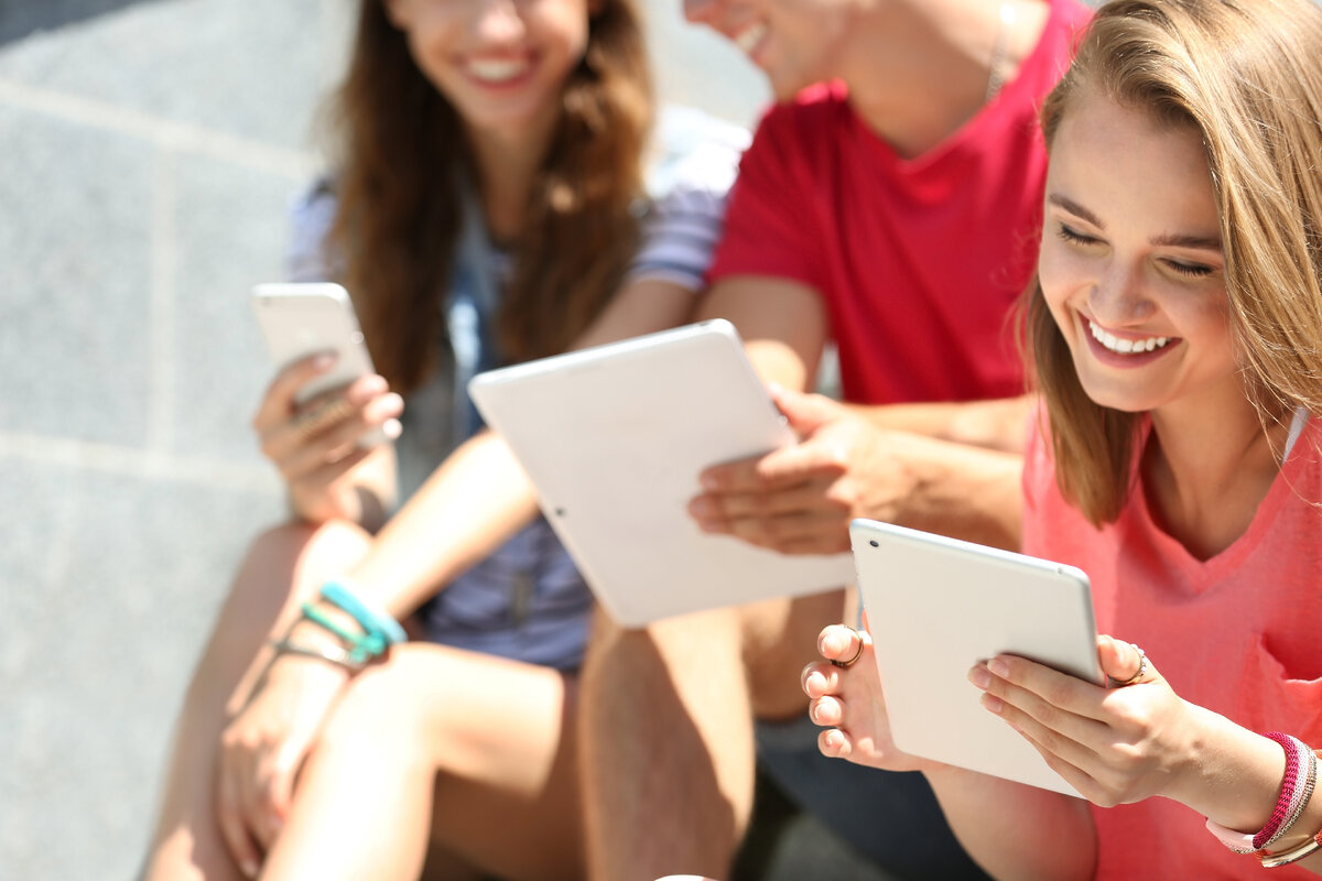 Teens Learning with Tablets.