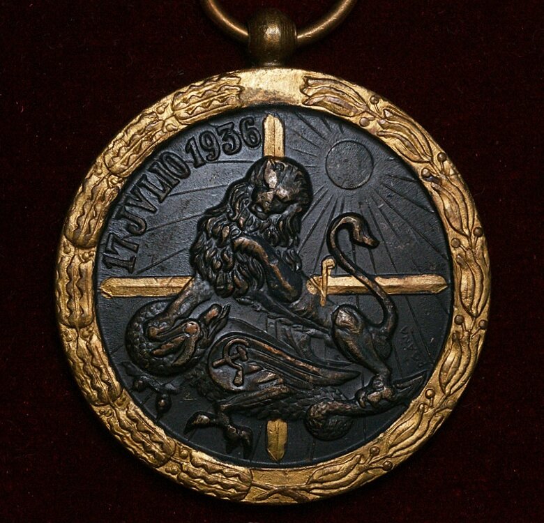 Аверс медали "За Испанскую кампанию" (исп. Medalla de la Campaña Española), которая предназначалась для отличившихся бойцов Испанской Фаланги, немецкого легиона "Кондор" и итальянских добровольцев. Учреждена 26 января 1937 года