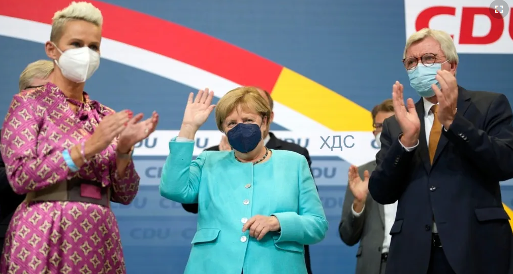 Ангела Меркель на выборах в Бундестаг. https://www.voanews.com/a/goodbye-chancellor-merkel-hello-chancellor-merkel/6246970.html
