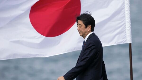    Синдзо Абэ© AP Photo / Marco Garcia