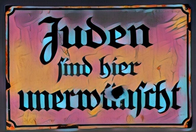 Надпись на табличке "Евреи здесь нежелательны"