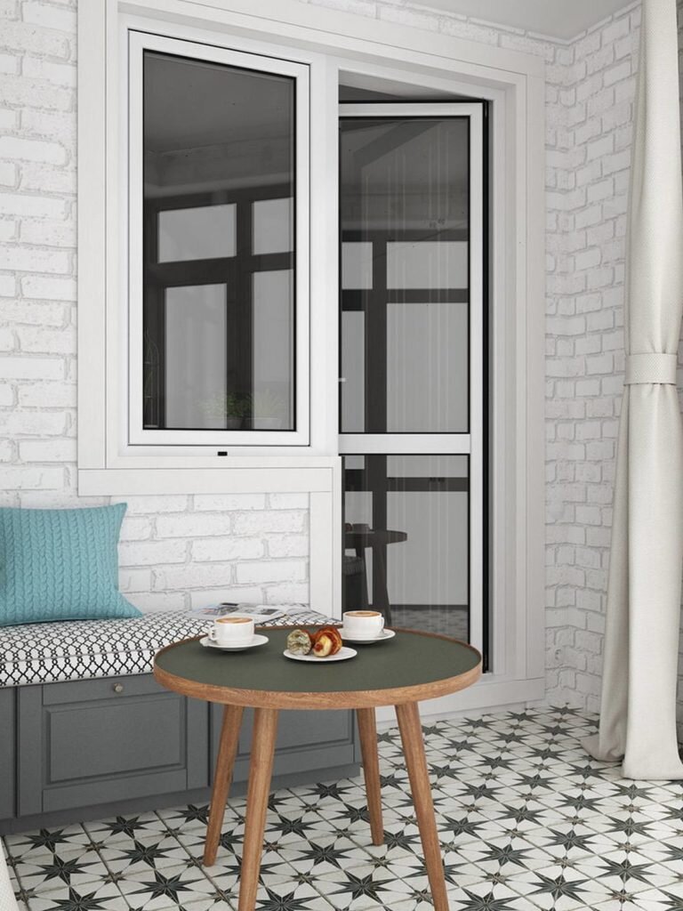 Кухня-гостиная, спальня, прихожая и полноценное рабочее место. Студия 28 кв.м. в монохромной палитре