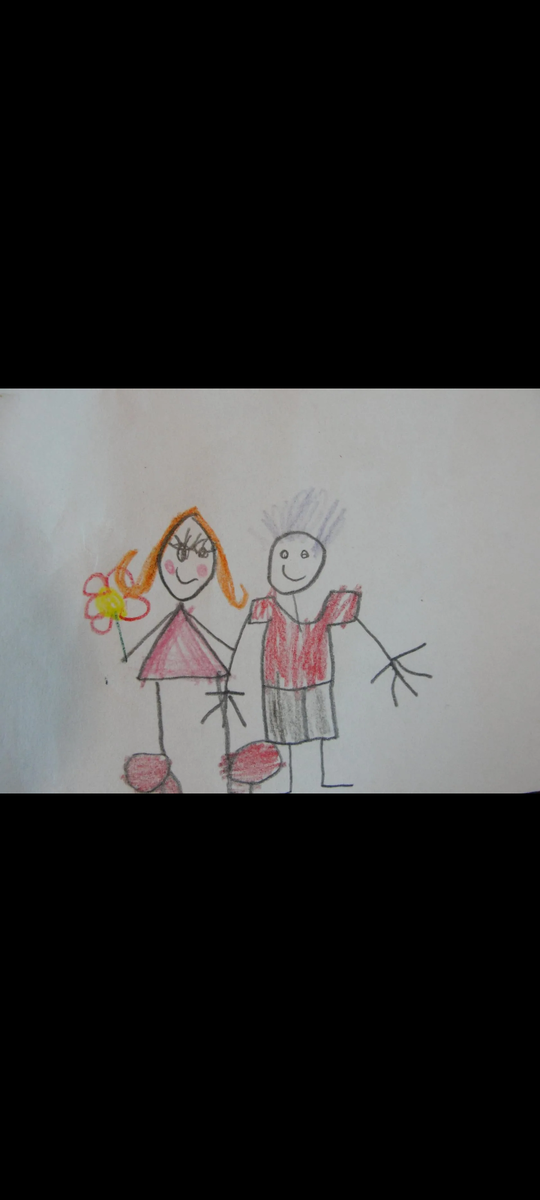 Фото автора. На рисунке я и мой муж. Средняя внучка рисовала, когда была маленькой. 