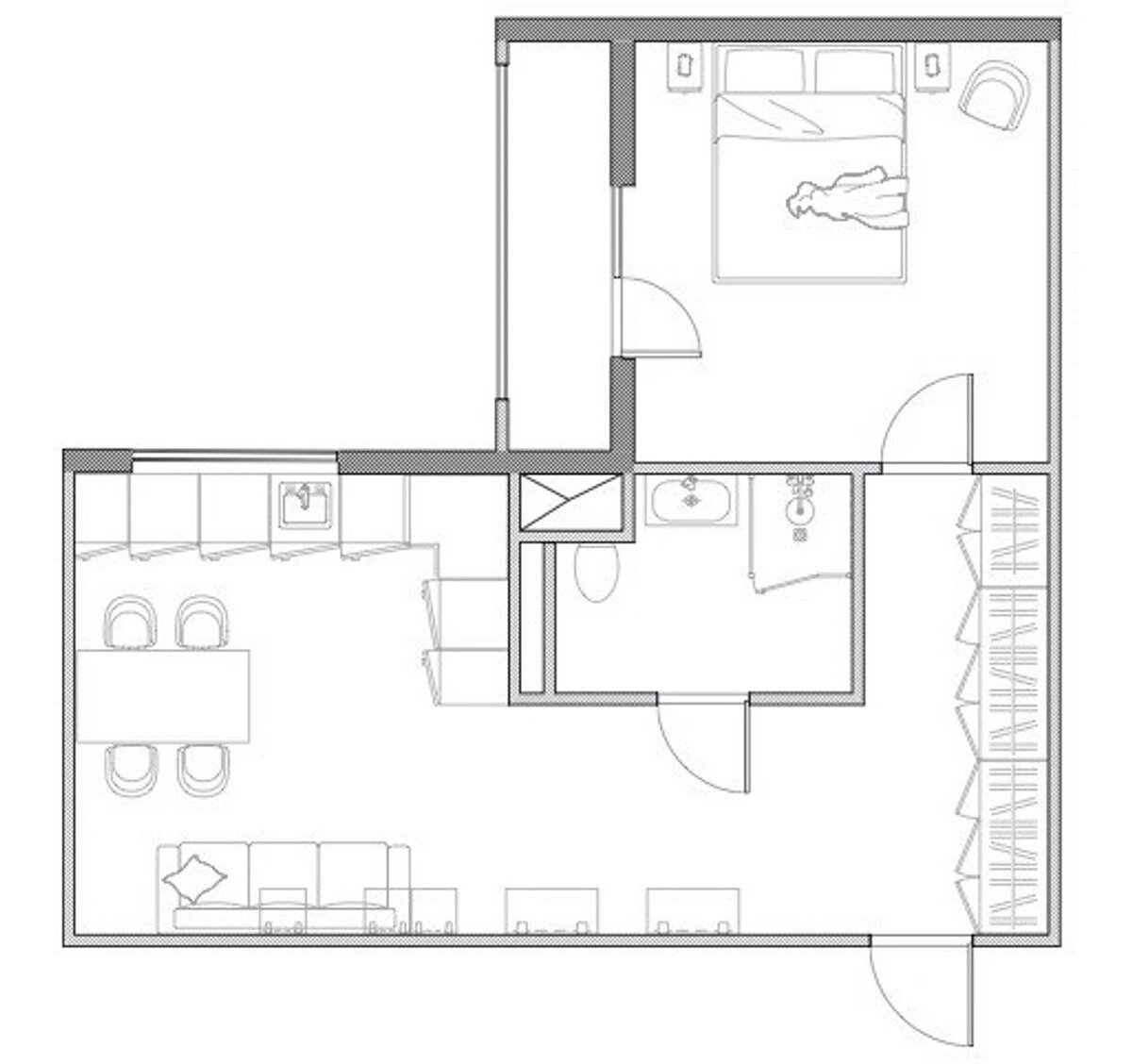В результате перепланировки прихожую объединили с кухней-гостиной, это позволило впустить туда больше естественного света и частично завести зону гостиной в коридор.