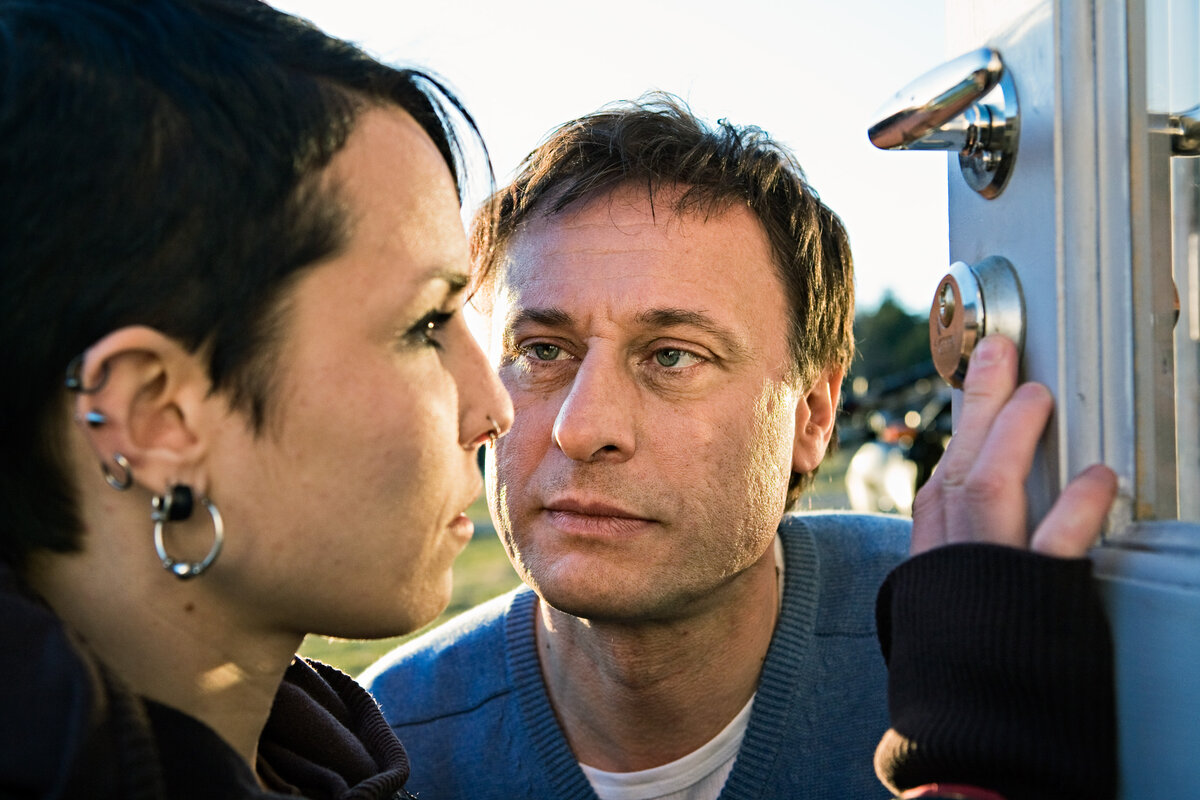 Кадр из фильма "Девушка с татуировкой дракона", 2009 г.