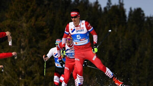    Российский лыжник Евгений Белов© РИА Новости / Александр Вильф