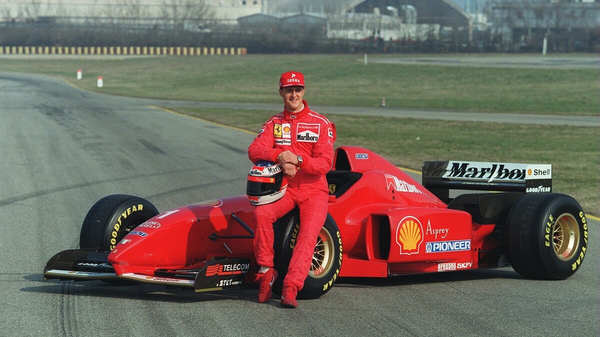 F1 Drivers sit in car