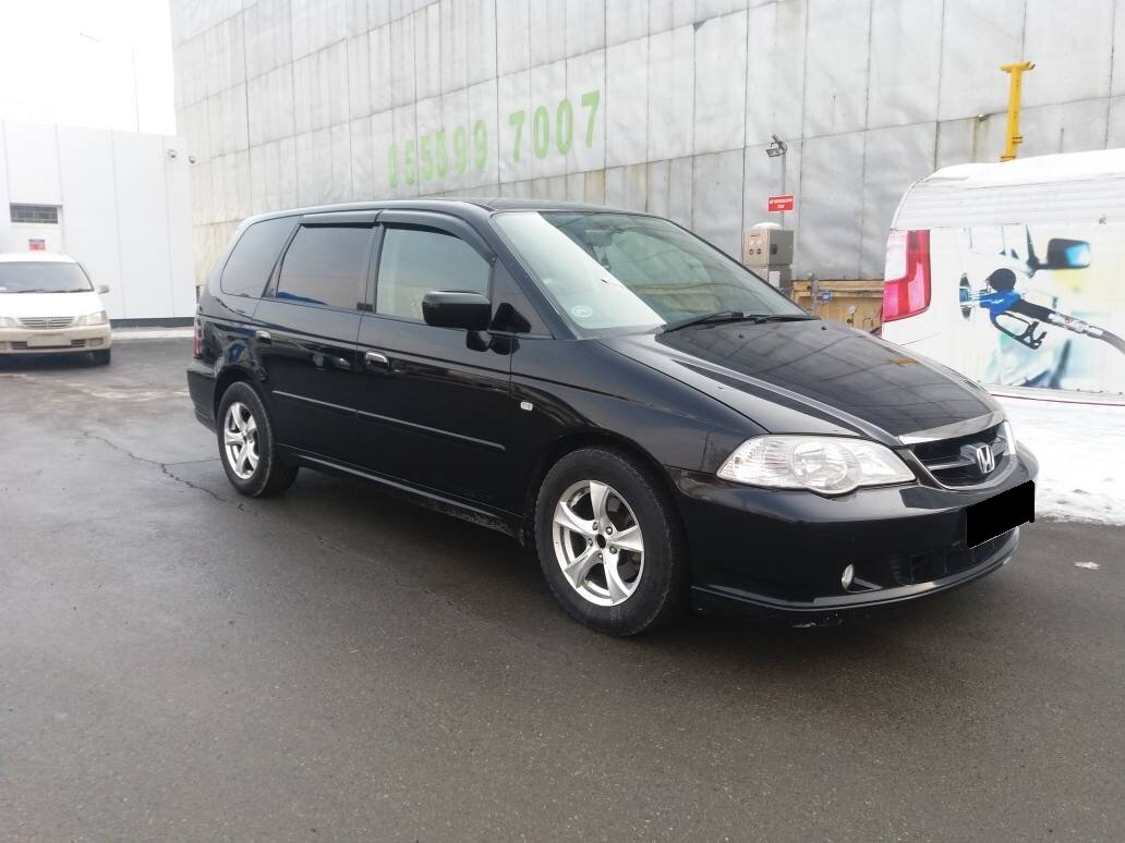 Черный одиссей. Хонда Одиссей Абсолют 2003. Honda Odyssey 2 поколение. Хонда Одиссей 2 поколения черный. Honda Odyssey 1 поколение.