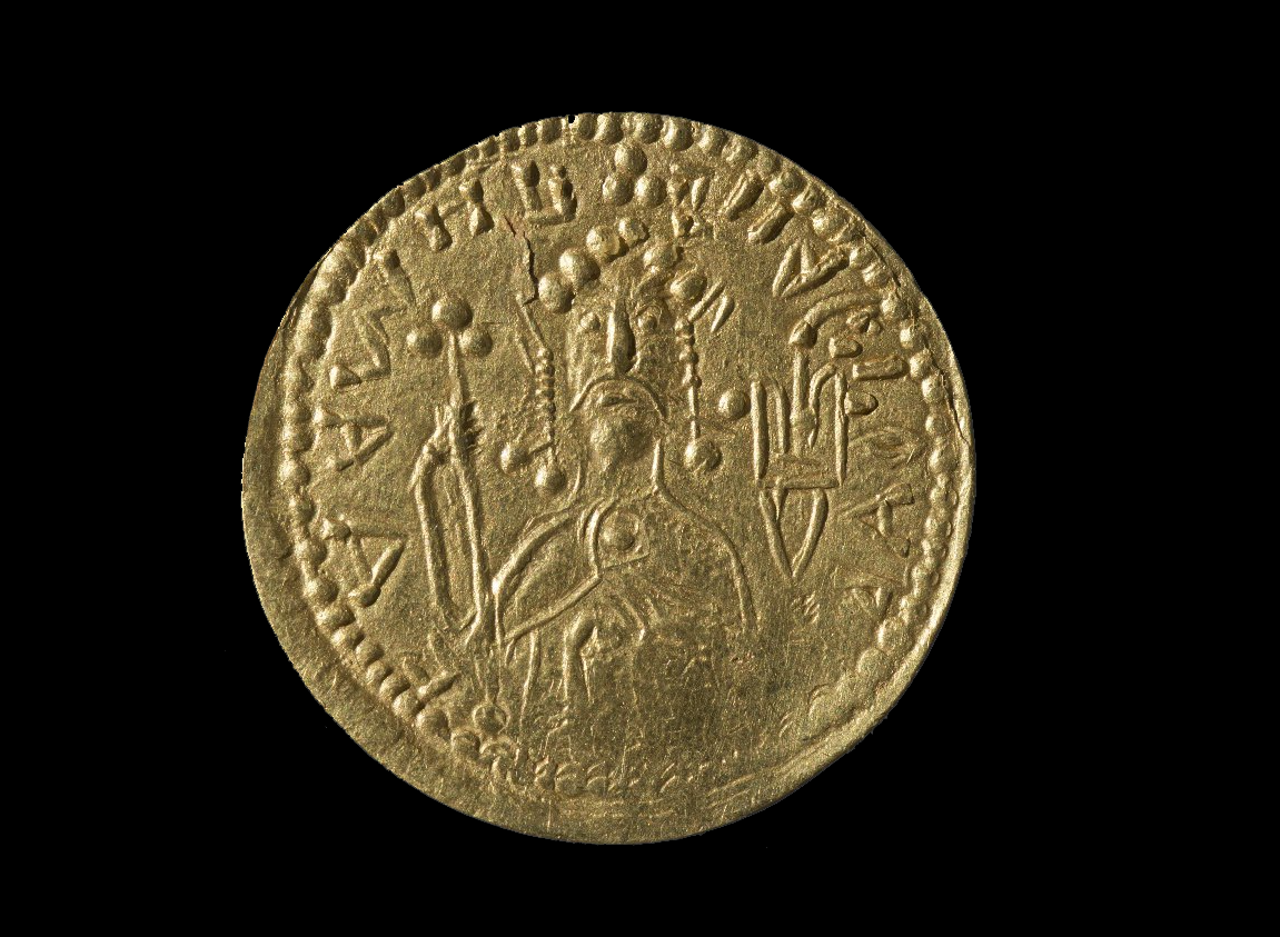 Златник происходит из клада византийских монет. На лицевой стороне помещено изображение сидящего на троне князя, на голове которого увенчанная крестом шапка с подвесками. Правой рукой князь держит крест на длинном древке, левая лежит на груди. Над левым плечом княжеский знак – трезубец, или «знак Рюриковичей». На лицевой стороне монеты – круговая надпись справа налево: ВЛАДИМИРЪ НА СТОЛЕ. На оборотной – погрудное изображение Христа с Евангелиемв левой руке, благословляющего правой, и надпись: IСУСЪ ХРИСТОСЪ.