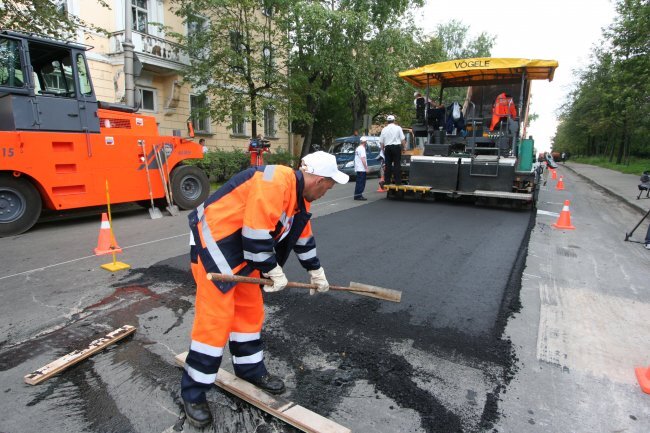 Укладка асфальта в дождь