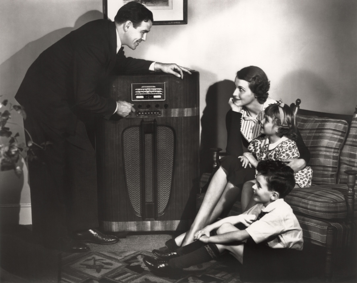 Listening family. To или on the Radio. Collective Listening to old Radio Egypt. How old is the first Radio Set. Old timestamp.