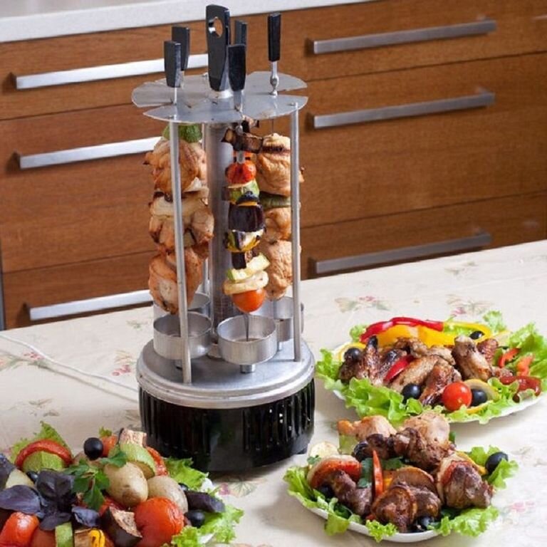 электро прибор, устанавливаемый в кухне, дома или на даче, для приготовления шашлыка в любую погоду, не выходя на улицу, без углей и дров.  Она станет отличным вариантом для домоседов, не любящих особенно выезжать на природу, но обожающих лакомится мясом, обжаренным на шампурах.
 Принцип получения этого всеми любимого блюда сходен с уличным, но не совсем. Снаружи шашлычница закрывается металлическим кожухом, играющим защитную роль, предотвращая разбрызгивание жира по сторонам, 
 а также способствующим максимальному удержанию внутри всего жара, не давая ему расходоваться впустую. 
 Жир, неизбежно образующийся в процессе жарки, стекает в небольшие металлические чашечки.
 У каждого шампура есть своя отдельная. Потом вы сможете легко их помыть, как и остальные части прибора.
 **** В качестве исходного продукта может выступать не только мясо (свинина, говядина, баранина), 
 но и птица, морепродукты, грибы и овощи. 
 В данной модели одновременно можно готовить на шести шампурах, на каждом помещается до 7 средних кусков.
 Мощность шашлычницы составляет 1000 Вт, до своего полностью рабочего состояния она способна разогреться всего за 5 минут.
 Все шампуры крепятся вертикально, прочно фиксируются на своих местах и во время готовки вращаются вокруг нагревательного элемента со скоростью до двух оборотов в минуту.
 На приготовление одной порции ароматного блюда  уходит не более 15-20 минут. *** Техническое описание 
    Мощность: 1000 Вт
    Время приготовления шашлыка: 10-15 мин
    Количество шампуров: 6
    Чашечки для сбора сока/жира: нержавеющая сталь
    Съемный защитный кожух для удобства очистки: нержавеющая сталь
    Вращение шампуров: автоматическое 
    Нагревательный элемент: вертикальный тэновый 
    Тепловой экран: нержавеющая сталь
    Равномерный нагрев: есть
    Вес: 1.8 кг
 http://elektroshashlik.apishops.ru/