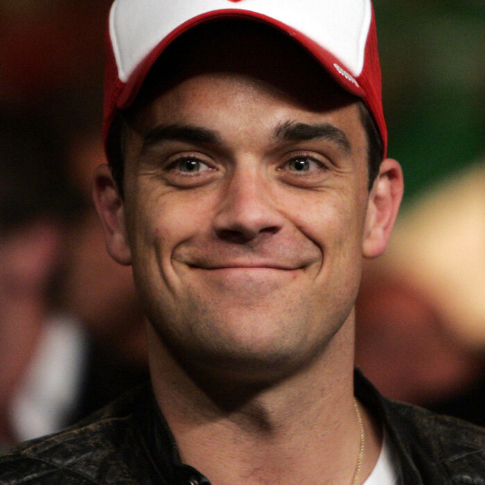 Робби Уильямс (Robbie Williams) / © AP Photo / Eric Jamison