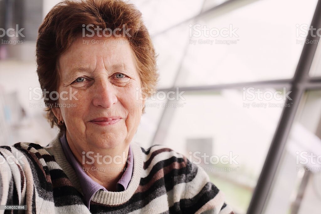 https://media.istockphoto.com/photos/portrait-of-70-years-old-woman-picture-id508032898