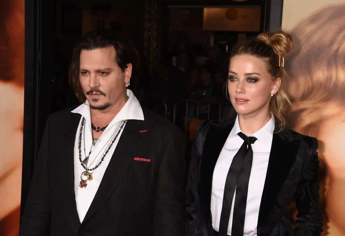 Актер Джонни Депп и его жена/актриса Эмбер Херд прибывают на премьеру фильма "Датчанка" 21 ноября 2015 года в Вествуде, штат Калифорния. Автор: Alami (ladbible.com)