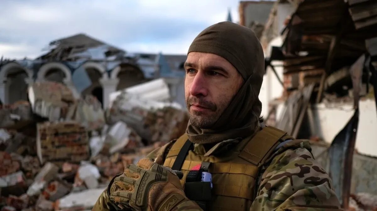 Спецслужбы Украины выкапывают тела умерших в Харьковской области. Фото: Vasco Sousa Cotovio/CNN