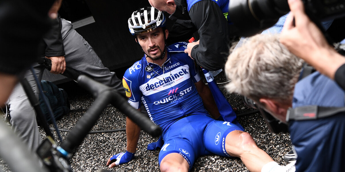 Team Deceuninck rider France’s Julian Alaphilippe © reacts after crossing the finish line of the twentieth stage of the 106th edition of the Tour de France cycling race between Albertville and Val Thorens, in Val Thorens, on July 27, 2019. (Photo by Anne-Christine POUJOULAT / AFP) 