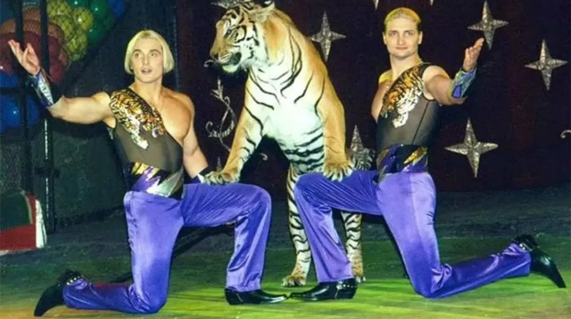 Эдгар и Аскольд Запашные с тигром