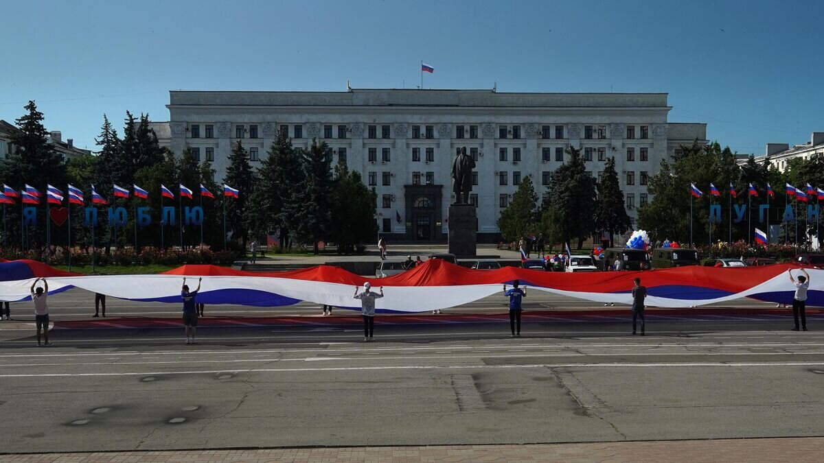    Флаг России в Луганске© РИА Новости / Максим Захаров