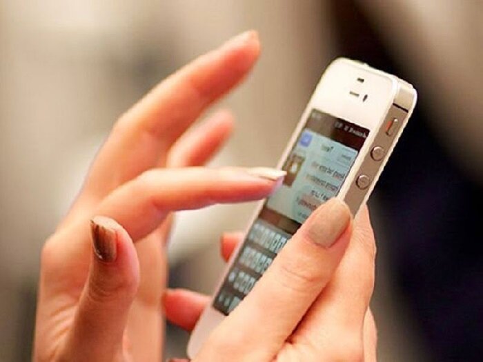 Фото Телефон в руках.