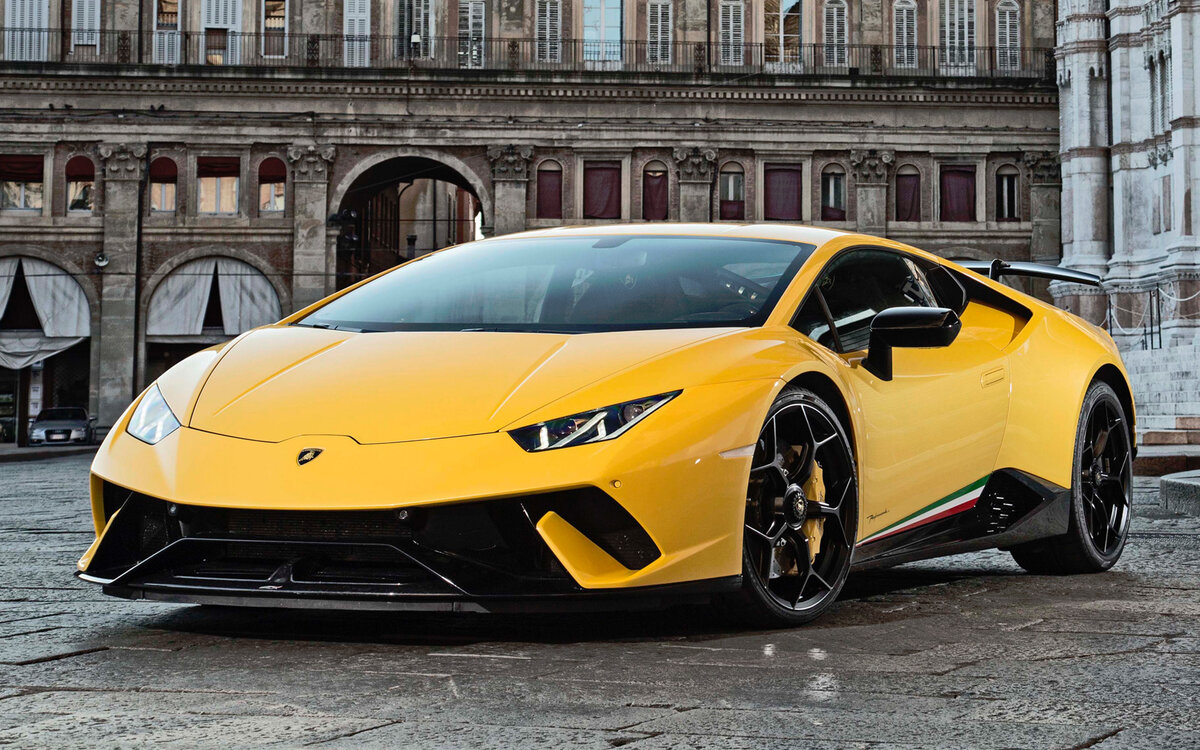 Ламборгини. Именно Г там произносится. https://auto.ironhorse.ru/wp-content/uploads/2018/05/huracan-coupe.jpg