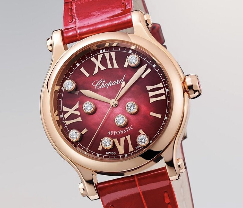 Часы Chopard Happy Sport в 33 мм корпусе из розового золота с 8 плавающими бриллиантами
