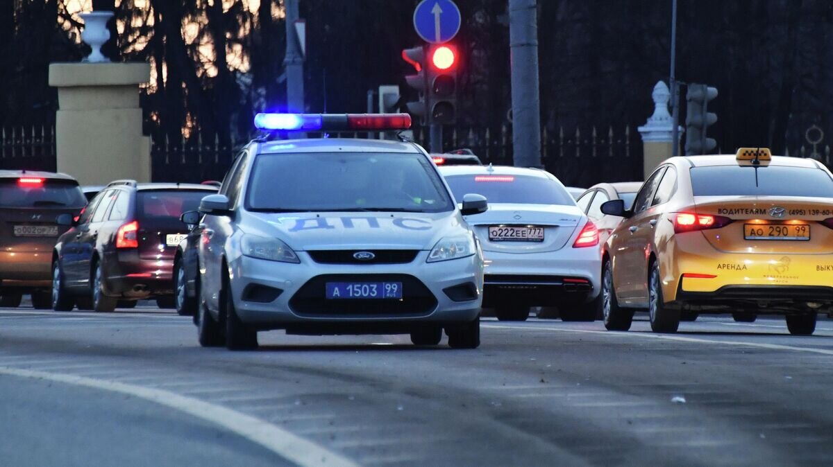    Автомобиль полиции на дороге© РИА Новости / Наталья Селиверстова