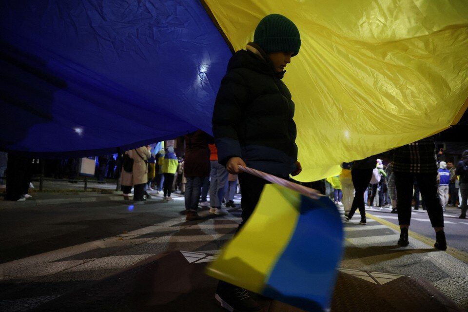    Митинг украинских беженцев в Варшаве, Польша.  REUTERS