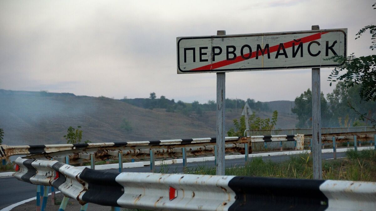    Указатель на выезде из города Первомайск© РИА Новости / Стрингер