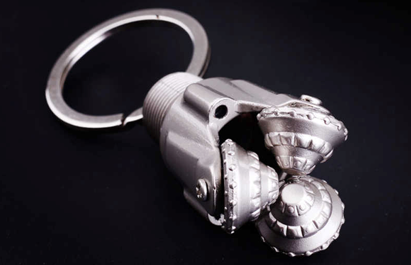 Брелок. Буровое трехшарошечное долото. Мой брелок, конечно не сохранился - лет 25 прошло. Фото из интернета. 