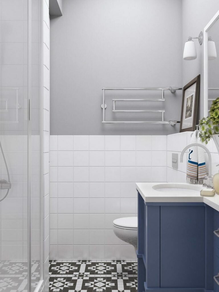 Кухня-гостиная, спальня, прихожая и полноценное рабочее место. Студия 28 кв.м. в монохромной палитре