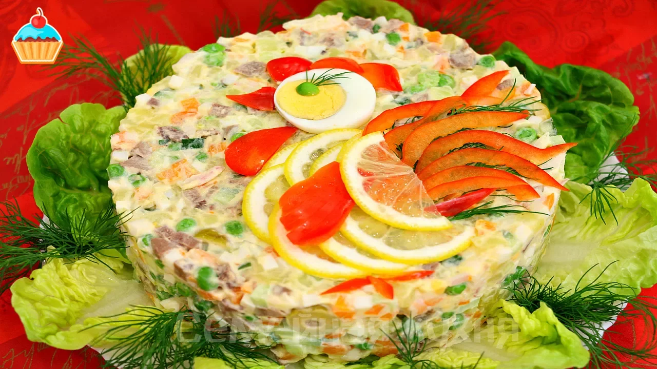 Салат Оливье по-царски с языком и креветками. Очень вкусно.