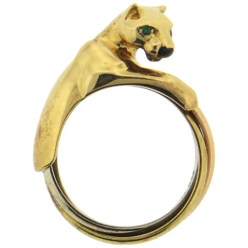 Золотое кольцо Cartier Panthere Trinity с изумрудом и ониксом.