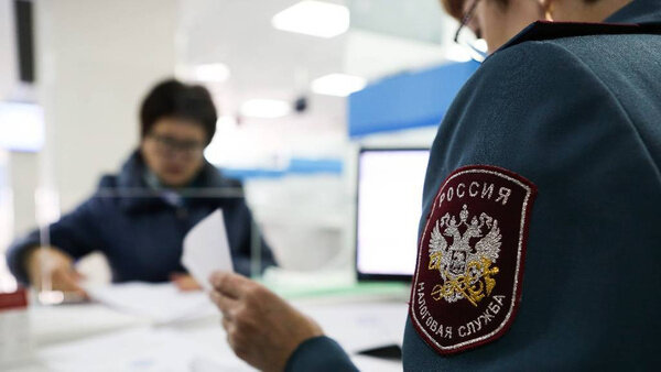 В инспекции Федеральной налоговой службы РФ. Фото © ТАСС / Антон Вергун