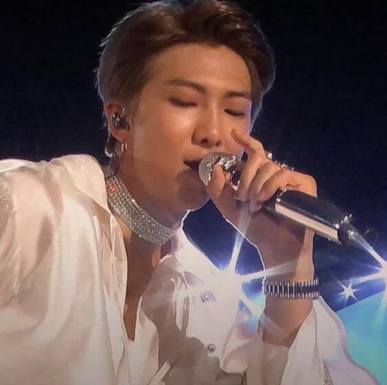 BTS. RM in choker.