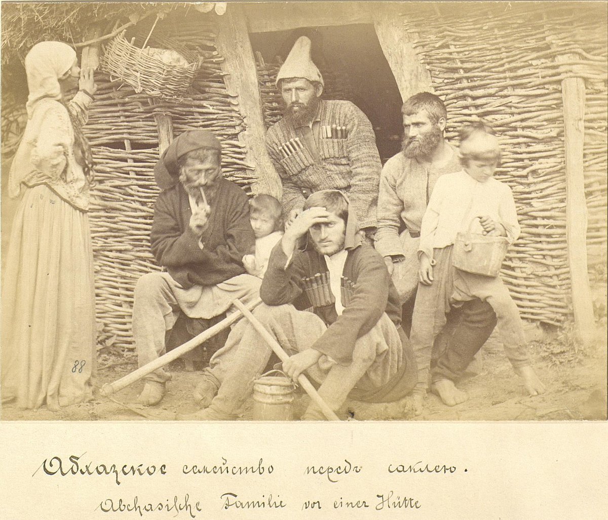 Абхазское семейство перед саклей (жилище), конец XIX века