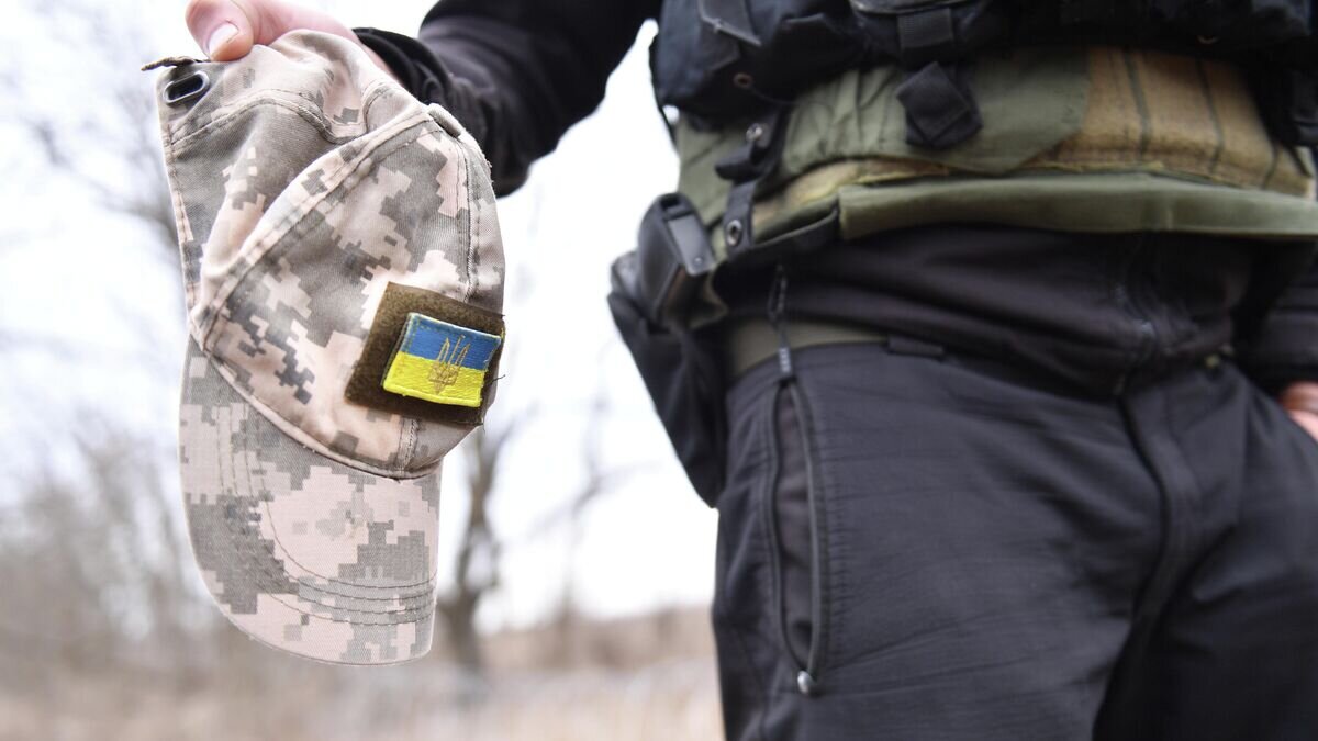   Кепка украинского военнослужащего© РИА Новости / Виктор Антонюк