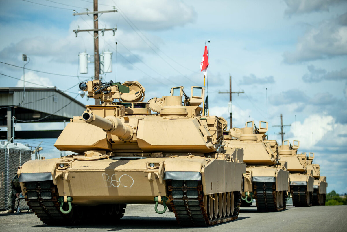    Troopers assigned to Bravo Company, 3rd Battalion, 8th Cavalry Regiment, 3rd Armored Brigade Combat Team (3ABCT), 1st Cavalry Division, stage the first set of new M1A2C (SEP v.3) Abrams Tanks at Fort Hood, Texas, July 21, 2020. The modernization of the Greywolf brigade, with the addition of receiving the new Abrams tanks, makes 3ABCT the most lethal and agile armored brigade in the Army. (U.S. Army photo by Sgt. Calab Franklin) grom