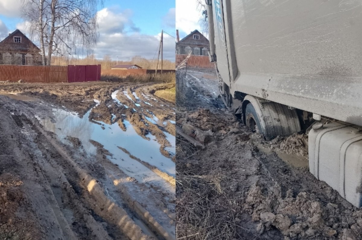    На разбитой дороге под Тверью мусоровоз утонул в грязи